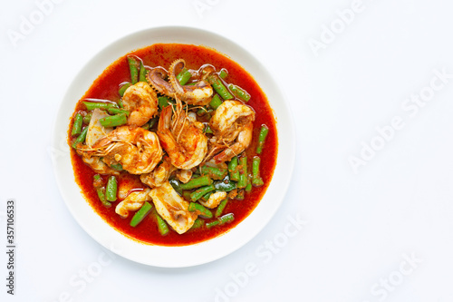 Spicy stir fried seafood and yard long bean with red curry paste. Thai food