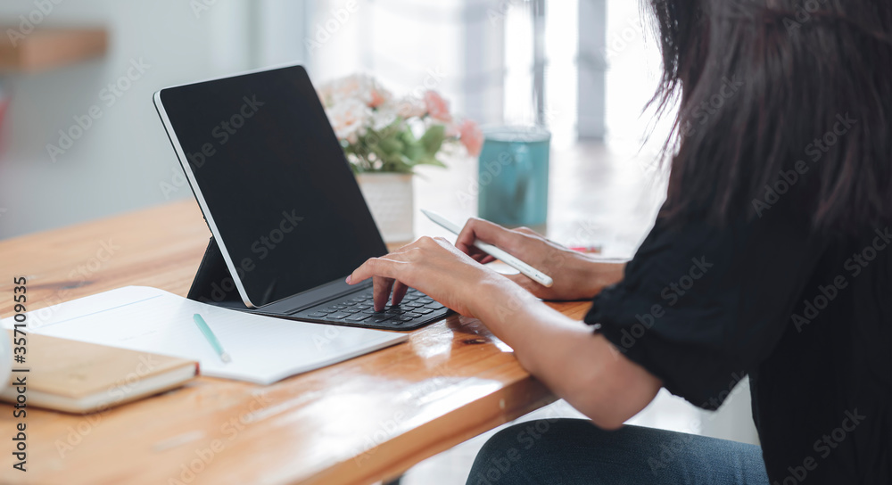 woman working with tablet computer at home. woman working with tablet computer at home.