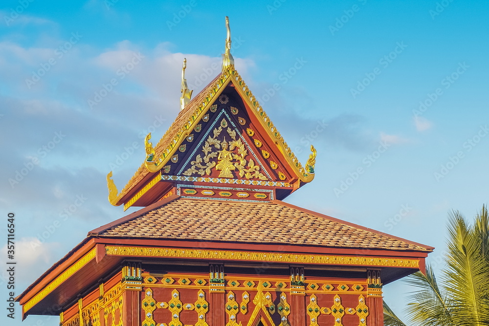 Ant's eye view of ancient traditional gable roof, Hor Kham Luang, Wat Hua Khuang, Nan Province, northern of Thailand. Ant's eye view of ancient traditional gable roof, Hor Kham Luang, Wat Hua Khuang, Nan Province, northern of Thailand.