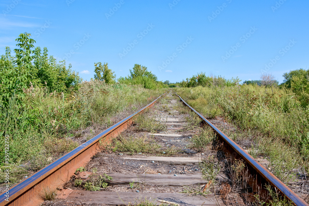 old railway rusty rails one way