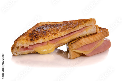 Toasted ham and cheese sandwich, croque monsieur, isolated on white background.