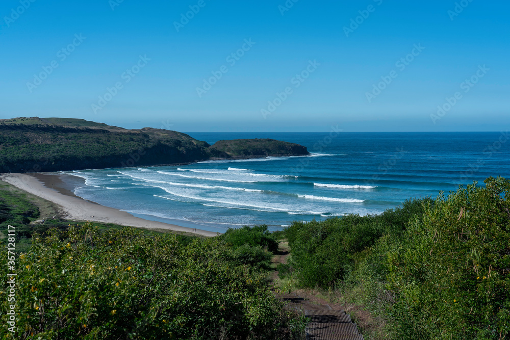 Pathway down to surf beach called The Farm which is a popular surfing beach on the South Coast in NSW in Australia