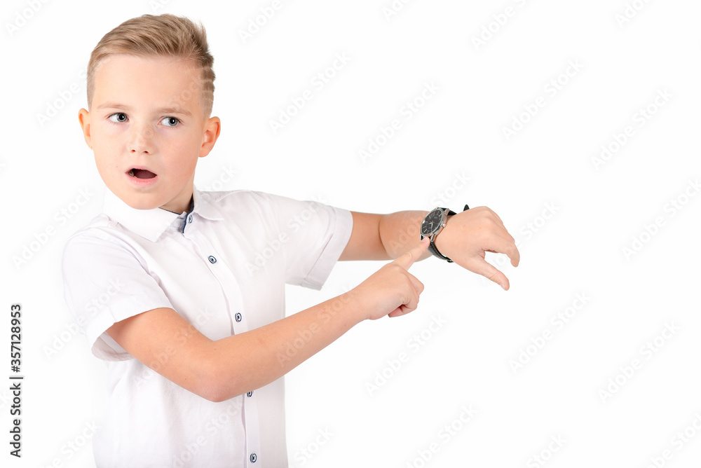 Surprised schoolboy with alarm clock and wach, isolated on white Surprised schoolboy with alarm clock and wach, isolated on white