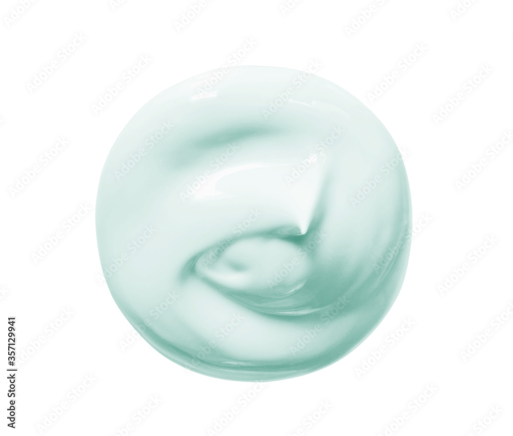 Cosmetic cream blob swatch isolated on white background. Pastel green face cream, makeup primer, color correcting cosmetic product Cosmetic cream blob swatch isolated on white background. Pastel green face cream, makeup primer, color correcting cosmetic product