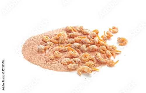 Closeup of dried shrimps and ground shrimps isolated on white background
