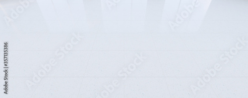3d rendering of terrazzo floor with gray grid line and shiny reflection with clear glass door in perspective view, clean and new condition use to background.