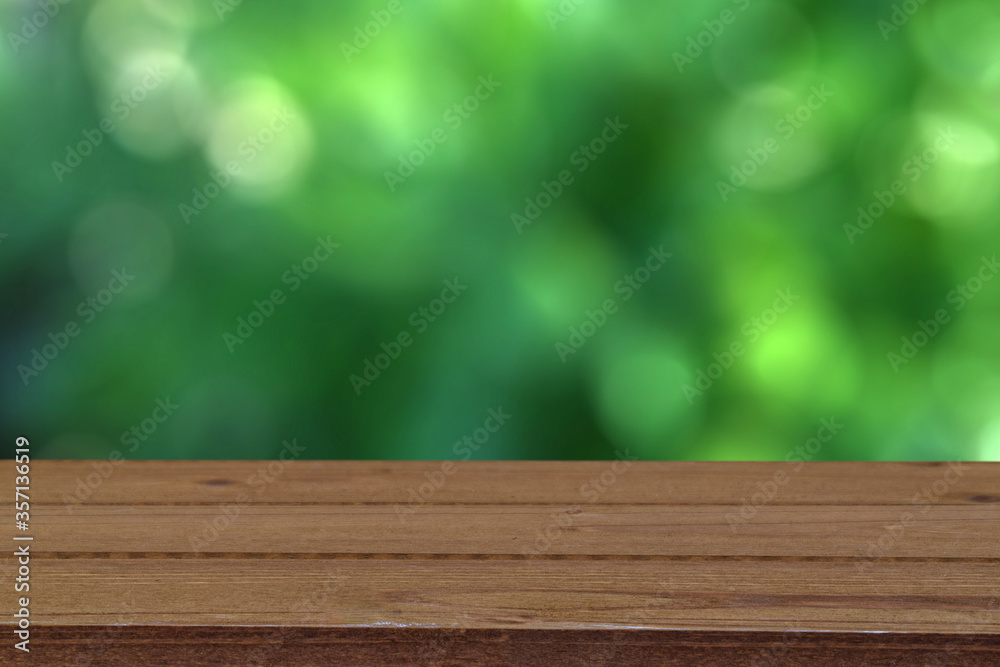 Rustic wood and bokeh trees background Rustic wood and bokeh trees background