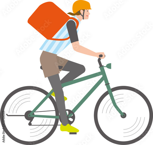 デリバリーのため自転車に乗る男性