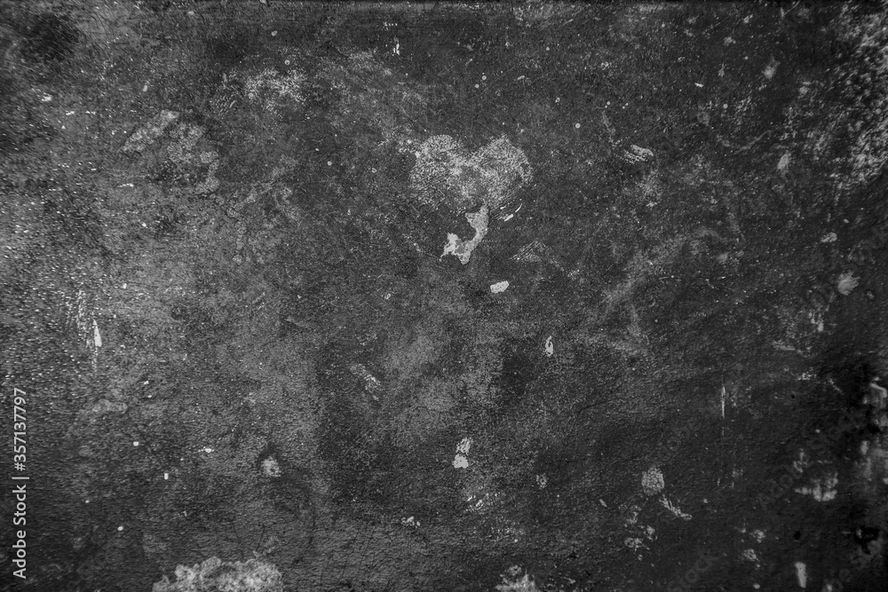 Texture of old cement wall, closeup black and white photo