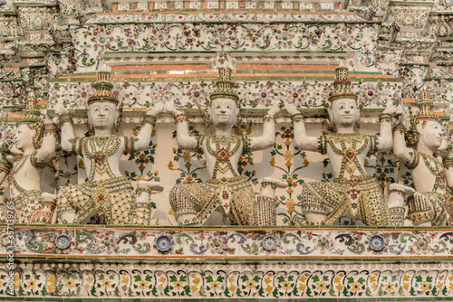 Angel statues carrying the base of Mondop  Wat Arun  Bangkok  Thailand.