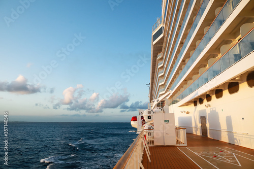 cruise ship  at sea on sunset background © Naz