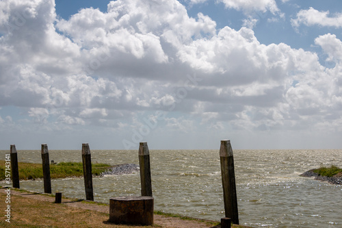 The IJssel lake near the village of Laaksum in the Netherlands, the smallest fishing village in Europe in the province of Friesland. photo