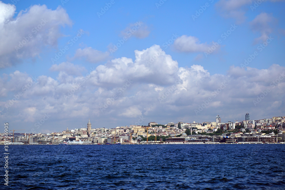 Istanbul city and Galata tower, blue sky and sea Istanbul city and Galata tower, blue sky and sea