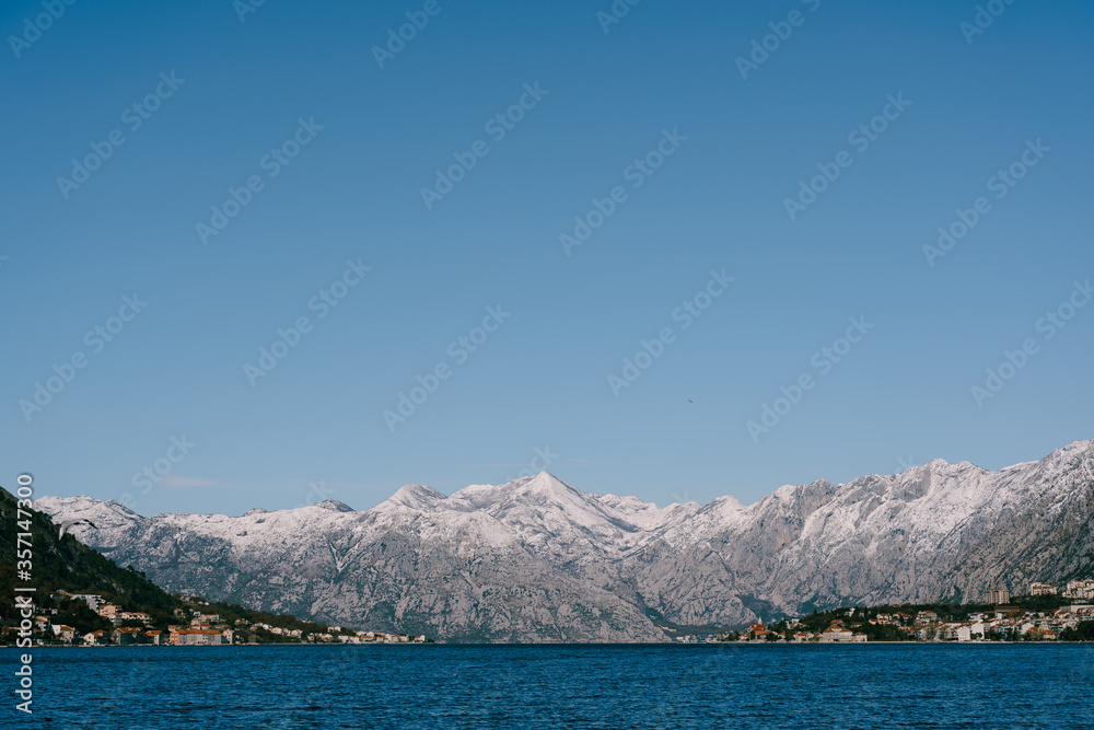 Snow-capped mountain tops in Bay of Kotor
