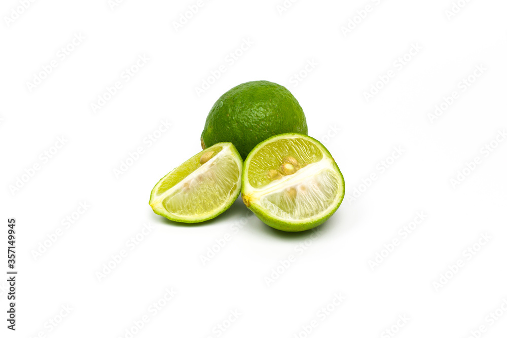 Fresh key limes or Limau Nipis on white background. 
