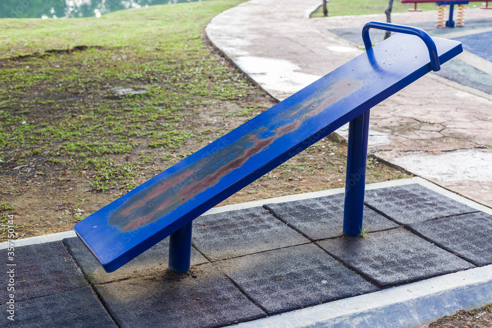 Outdoor fitness equipment for sit-up board and horizontal bar in a public park. Outdoor fitness equipment for sit-up board and horizontal bar in a public park.
