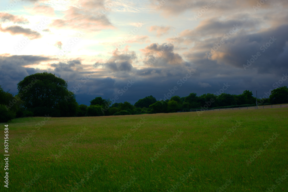 Moody sky above a field in Summer