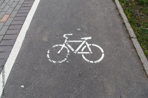 Bicycle sign shabby on the pavement