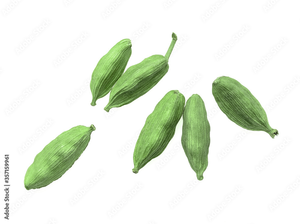 Green cardamom seeds isolated on a white background. view from above.