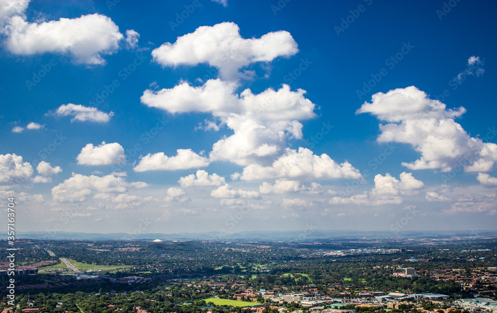 Fototapeta premium clouds over the city