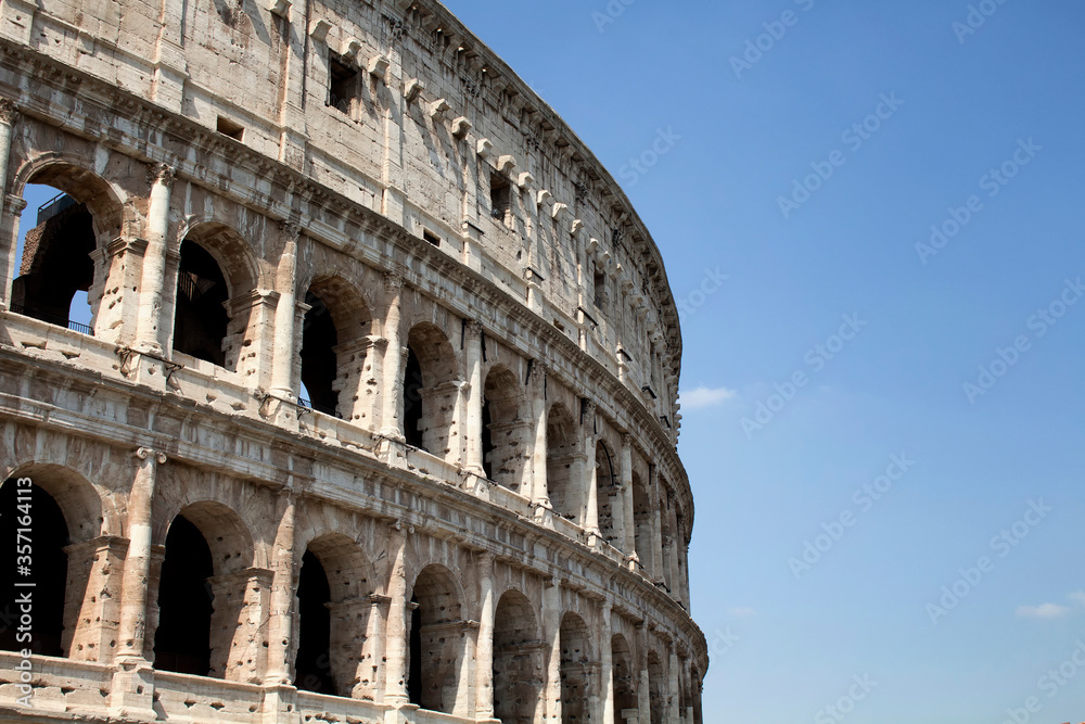 Bottom view of Colesseum with sky background in ancient Rome city