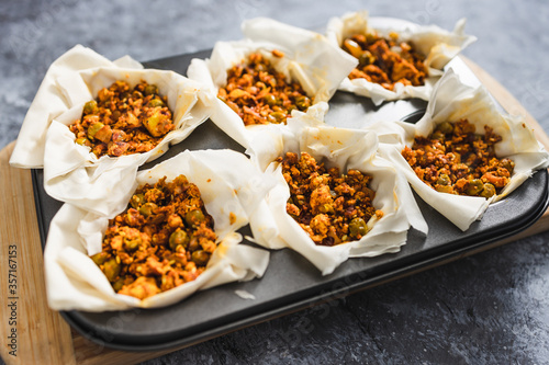 plant-based food, vegan filo pastries with spicy tofu and peas filling