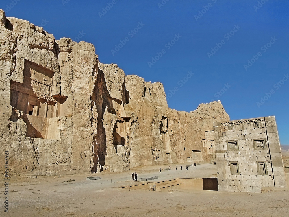 Panoramic view on Naqsh-e Rustam. Place is famous for its cross-formed rock tombs of Persian kings, bas-reliefs of Sassanian kings & mysterious Cube of Zoroaster. It's located near Persepolis, Iran