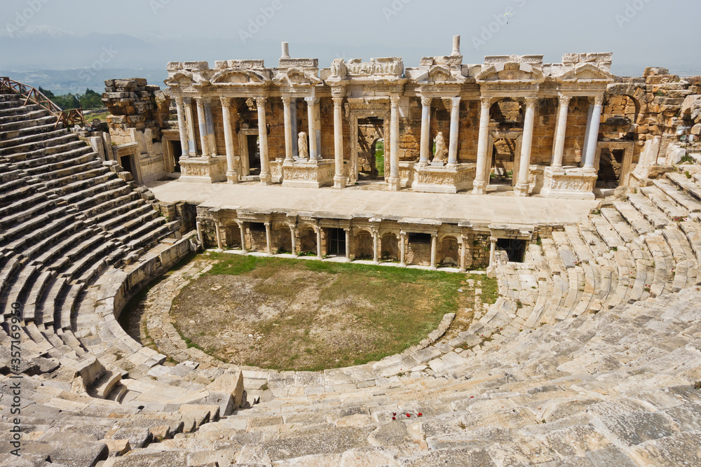Monumental amphitheater at archaelogical site of the ancient Greek city of Hierapolis, near Pamukkale, Denizli, Turkey