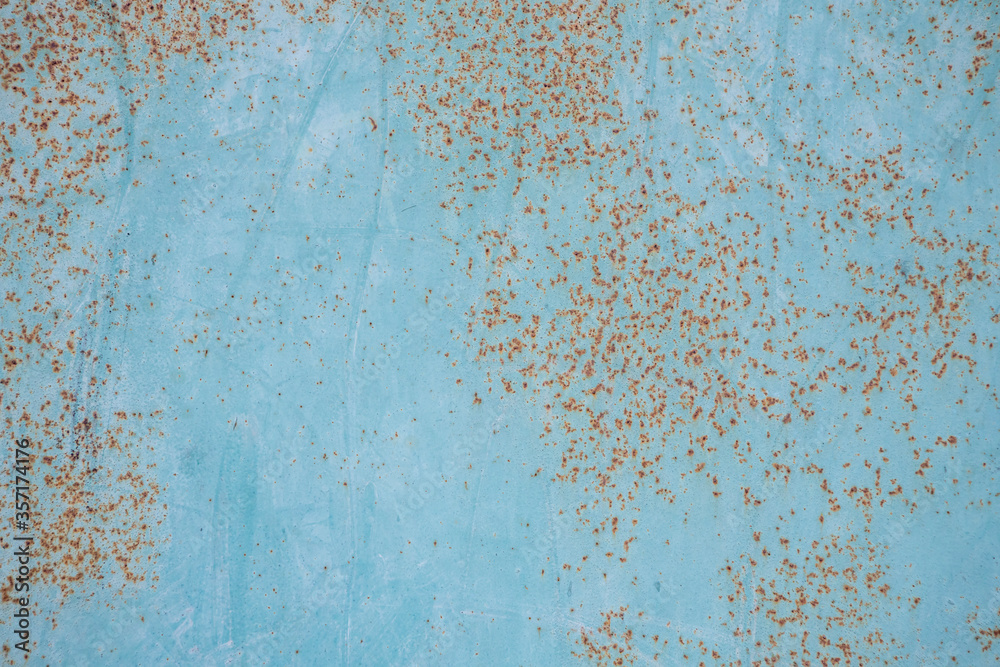 background and texture of old metal surface is covered with blue paint and rust background and texture of old metal surface is covered with blue paint and rust