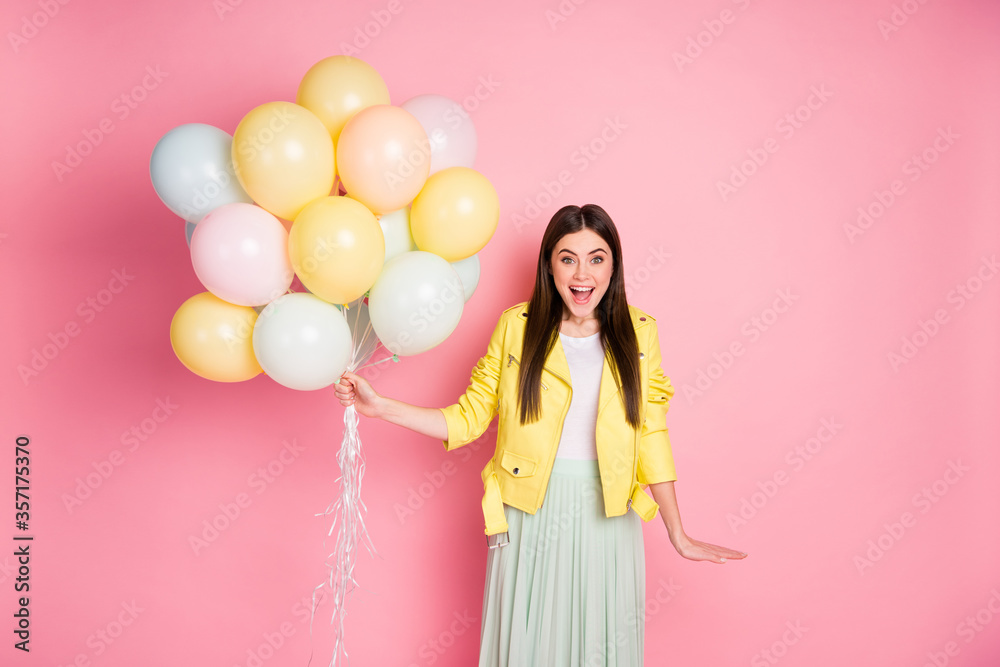 Portrait of her she nice-looking attractive pretty lovely cheerful cheery glad girl having fun holding in hands air balls isolated over bright vivid shine vibrant yellow color background Portrait of her she nice-looking attractive pretty lovely cheerful cheery glad girl having fun holding in hands air balls isolated over bright vivid shine vibrant yellow color background