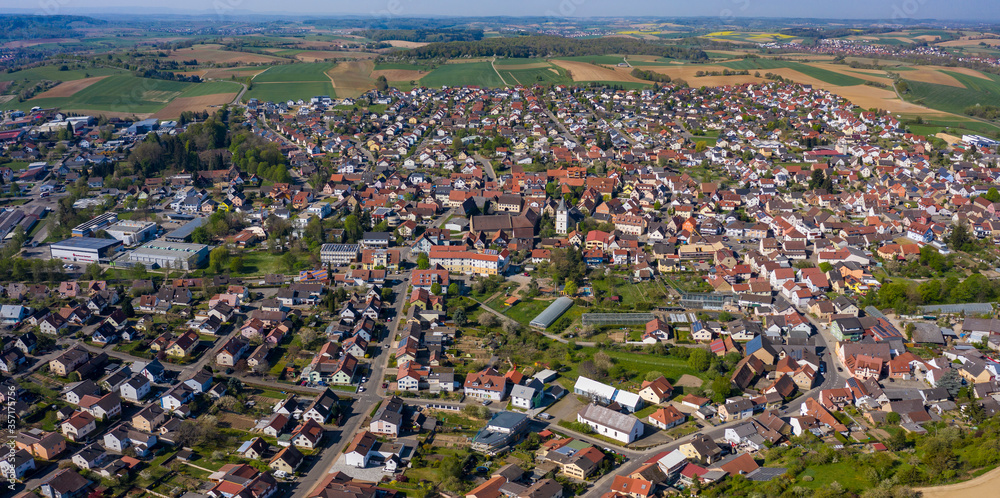 Aerial view of the city Sulzfeld and castle Ravensburg in Germany on a sunny day in early spring during the coronavirus lockdown