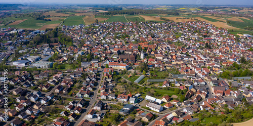Aerial view of the city Sulzfeld and castle Ravensburg in Germany on a sunny day in early spring during the coronavirus lockdown