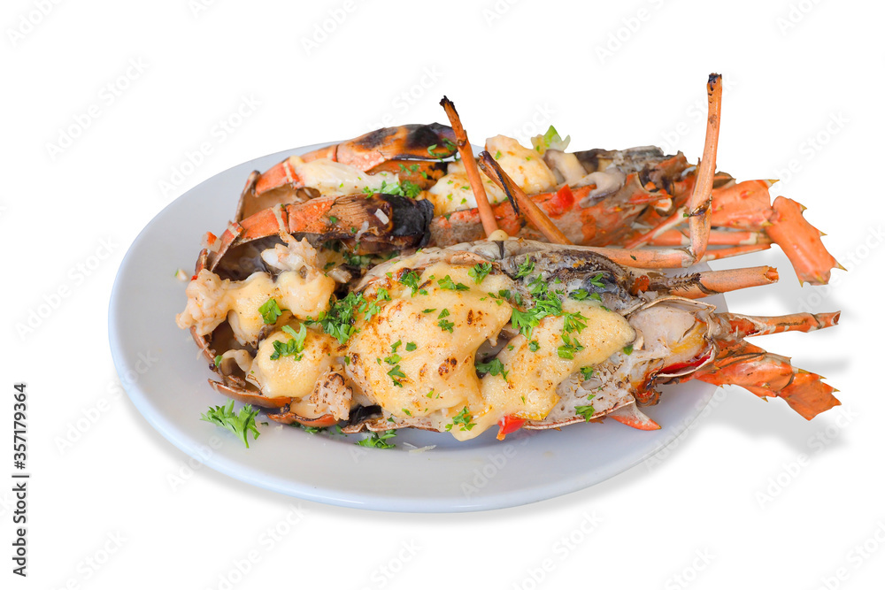 grilled lobaster with cheese called lobster thermidor served on white dish isolated with clipping path grilled lobaster with cheese called lobster thermidor served on white dish isolated with clipping path