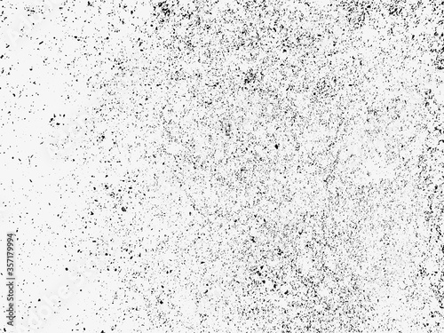 A black and white vector texture of distressed, urban, grungy concrete with aged and weathered damage. Ideal for use as a background texture or for applying grunge effects to your images.