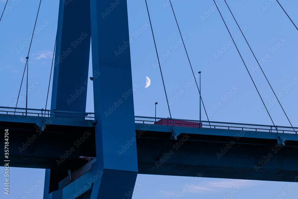close-up of Hamburg's Koehlbrand Bridge in the moonlight close-up of Hamburg's Koehlbrand Bridge in the moonlight