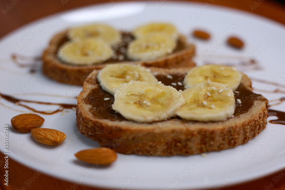 healthy dessert with chocolate paste and bananas healthy dessert with chocolate paste and bananas