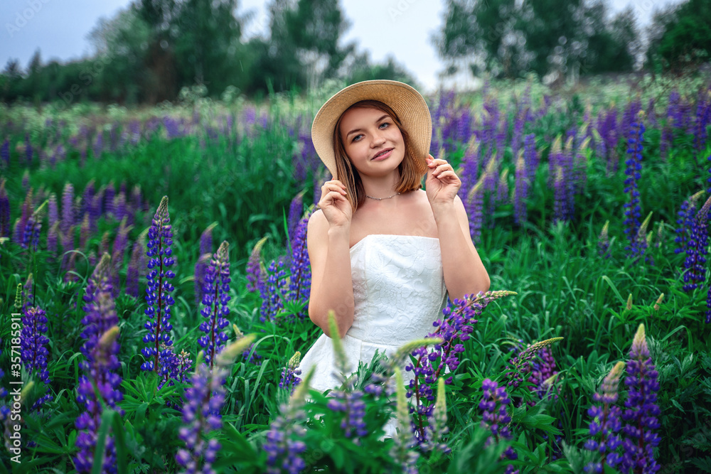 Beautiful girl in the middle of a field with lupins.
Lupine field and a beautiful girl. Beautiful woman in a lupine field Beautiful girl in the middle of a field with lupins.
Lupine field and a beautiful girl. Beautiful woman in a lupine field
