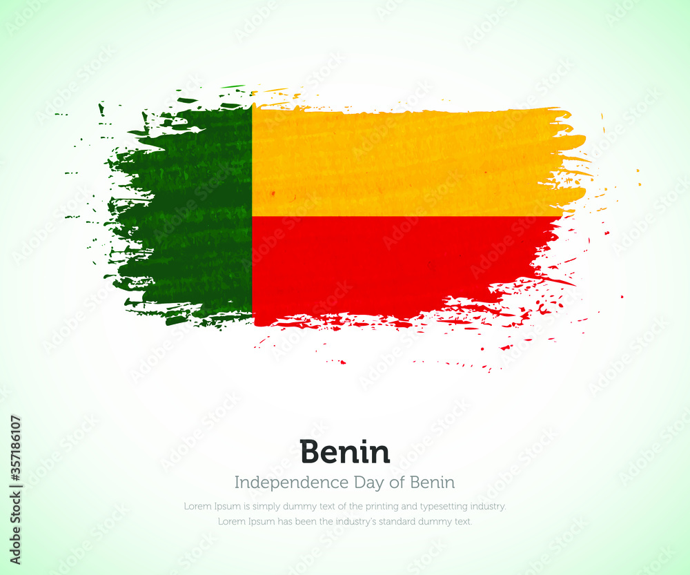 Obraz premium Independence day of Benin country. Abstract flag in shape of paint brush stroke with shiny colored background