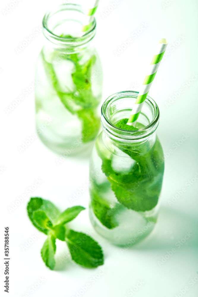 Fresh lemonade with mint in glasses Fresh lemonade with mint in glasses