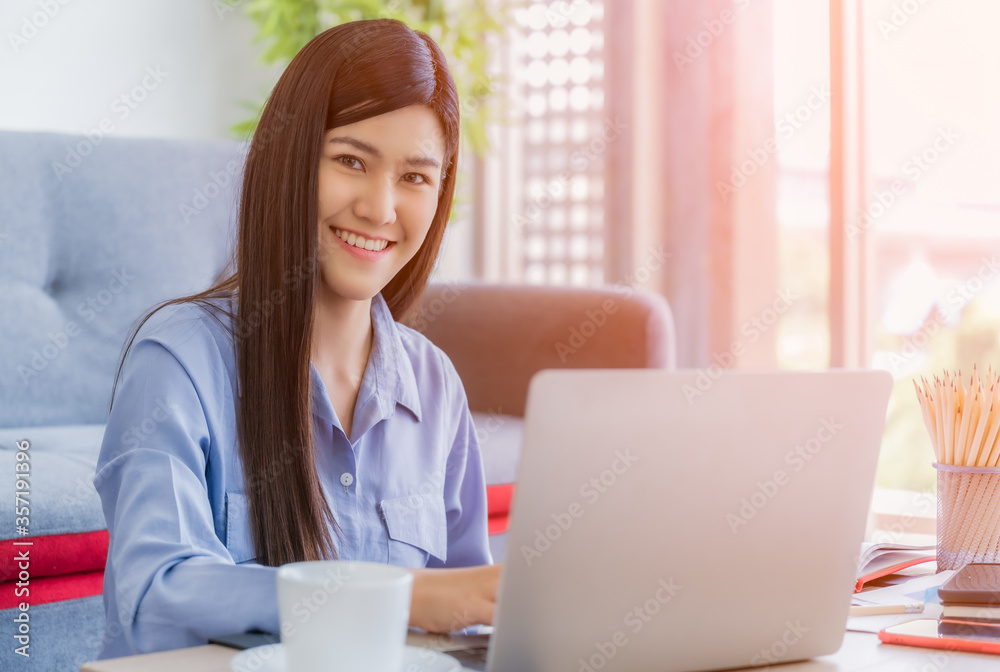 Beautiful asian businesswoman working from home. Beautiful asian businesswoman working from home.