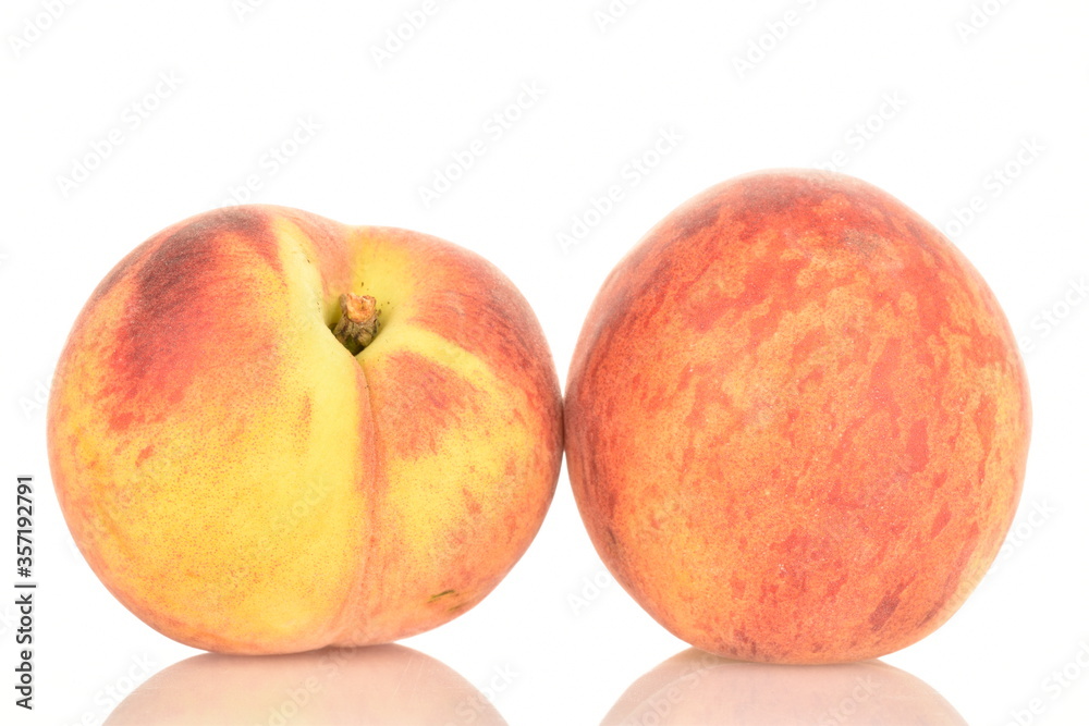 Ripe organic peach, close-up, on a white background Ripe organic peach, close-up, on a white background