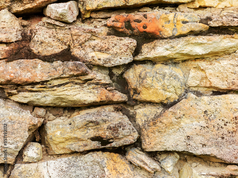 Abstract decorative wall of natural stone for any of your project. Great background or texture. Abstract decorative wall of natural stone for any of your project. Great background or texture.