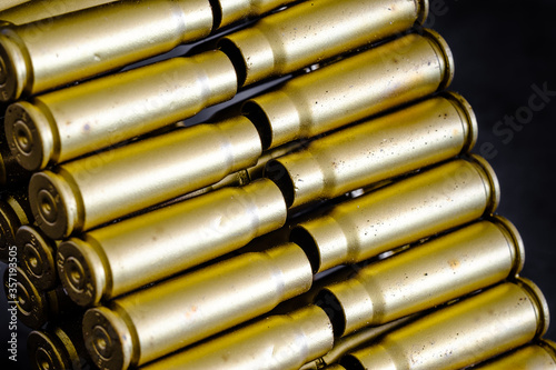 bullet shell cartridges on a black background closeup view