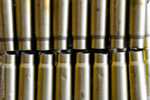 bullet shell cartridges on a black background closeup view