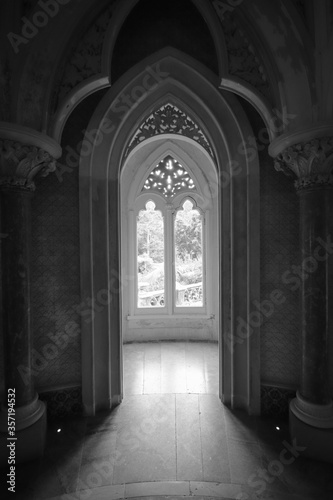 Amazing palace interior with a window to the garden in background. Monserrate Palace in Sintra, Portugal 