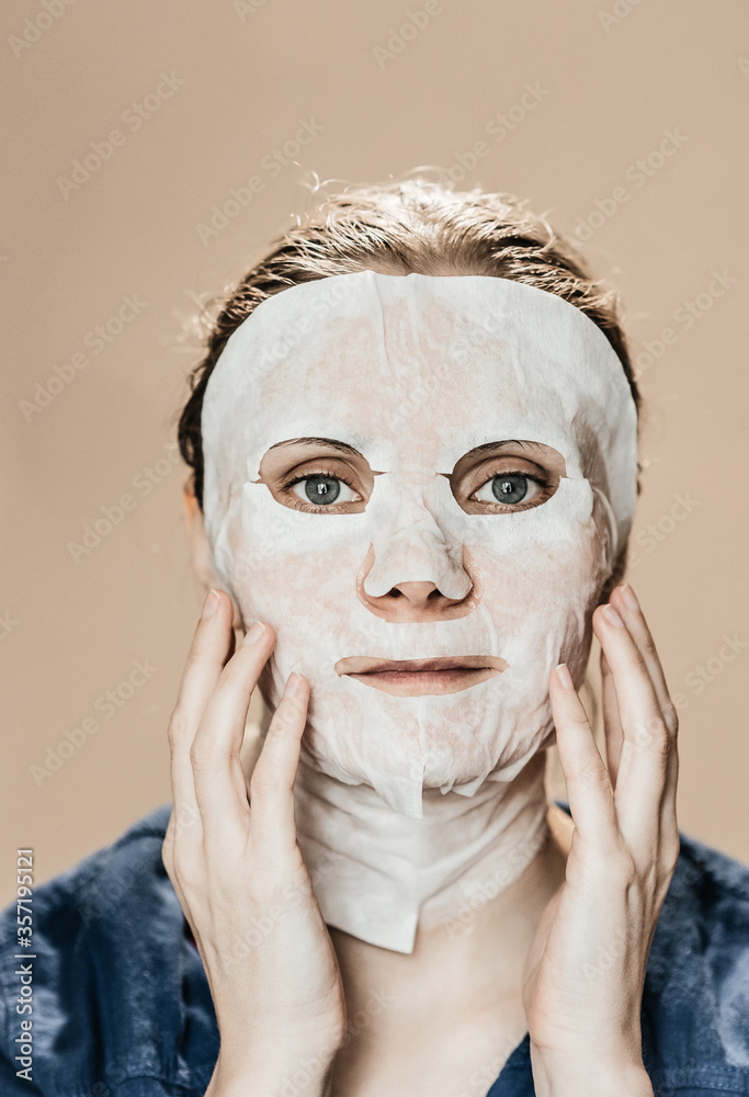 a girl in a trance mask for wrinkles and for smoothness and youthfulness of skin nutrition. restoration and hydration a girl in a trance mask for wrinkles and for smoothness and youthfulness of skin nutrition. restoration and hydration