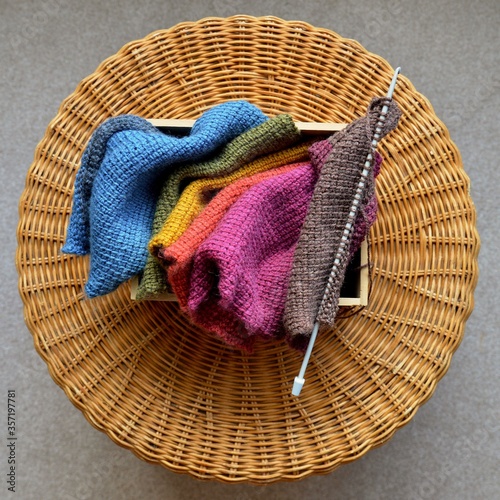 Crochet wool rainbow scarf and hook