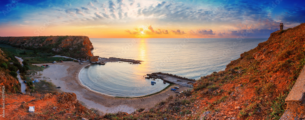 Coastal landscape, panorama - top view of the sunrise in the Bolata cove on the Black Sea coast of Bulgaria - obrazy, fototapety, plakaty 