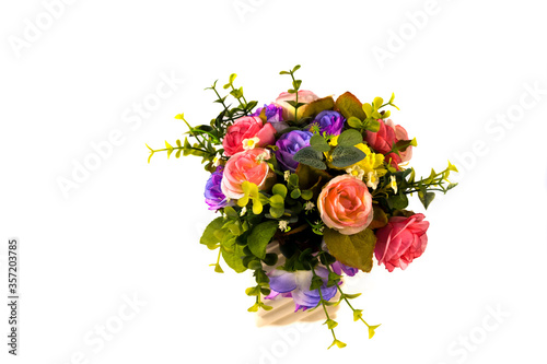 handcraft flowers in white ceramic vase with white background.