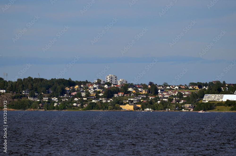 Oslofjord. View of the North Sea from Ferry from Horten to Moss connects Ostfold and Vestfold in Norway. Ferry crossing Oslofjord Oslofjord. View of the North Sea from Ferry from Horten to Moss connects Ostfold and Vestfold in Norway. Ferry crossing Oslofjord